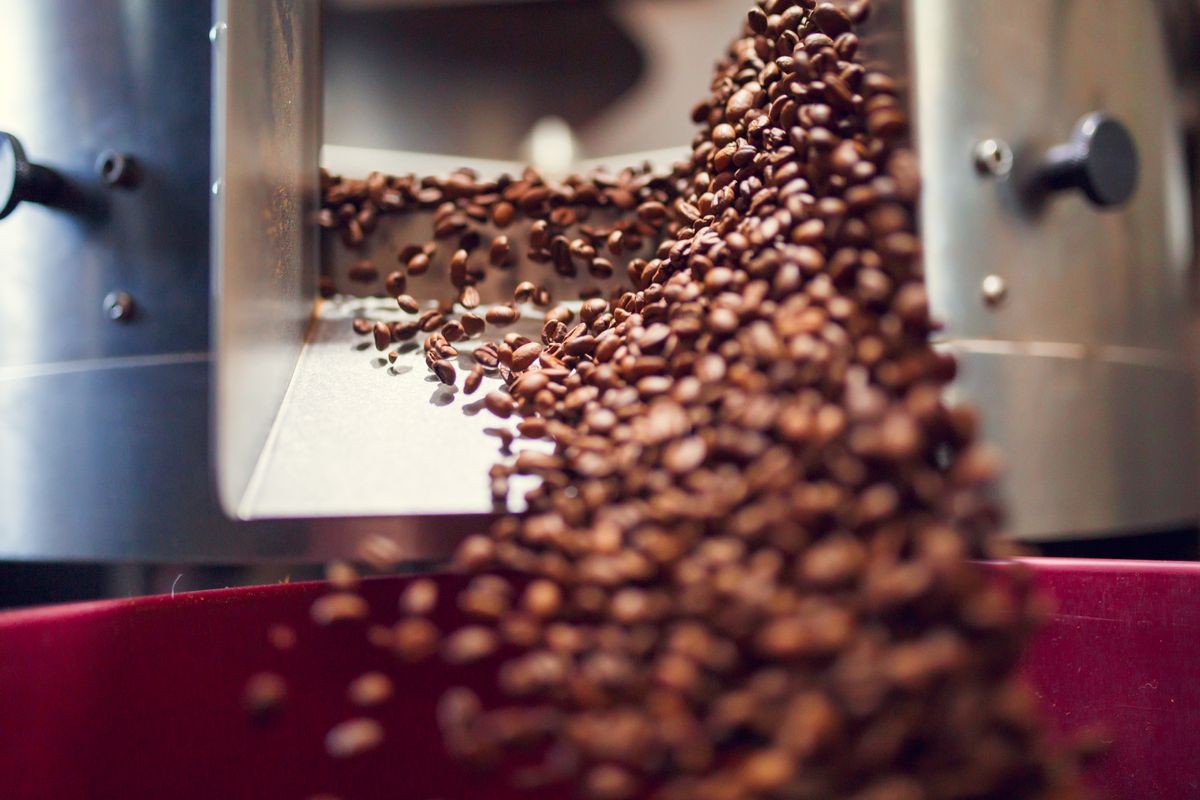 Picture of falling coffee beans from roaster